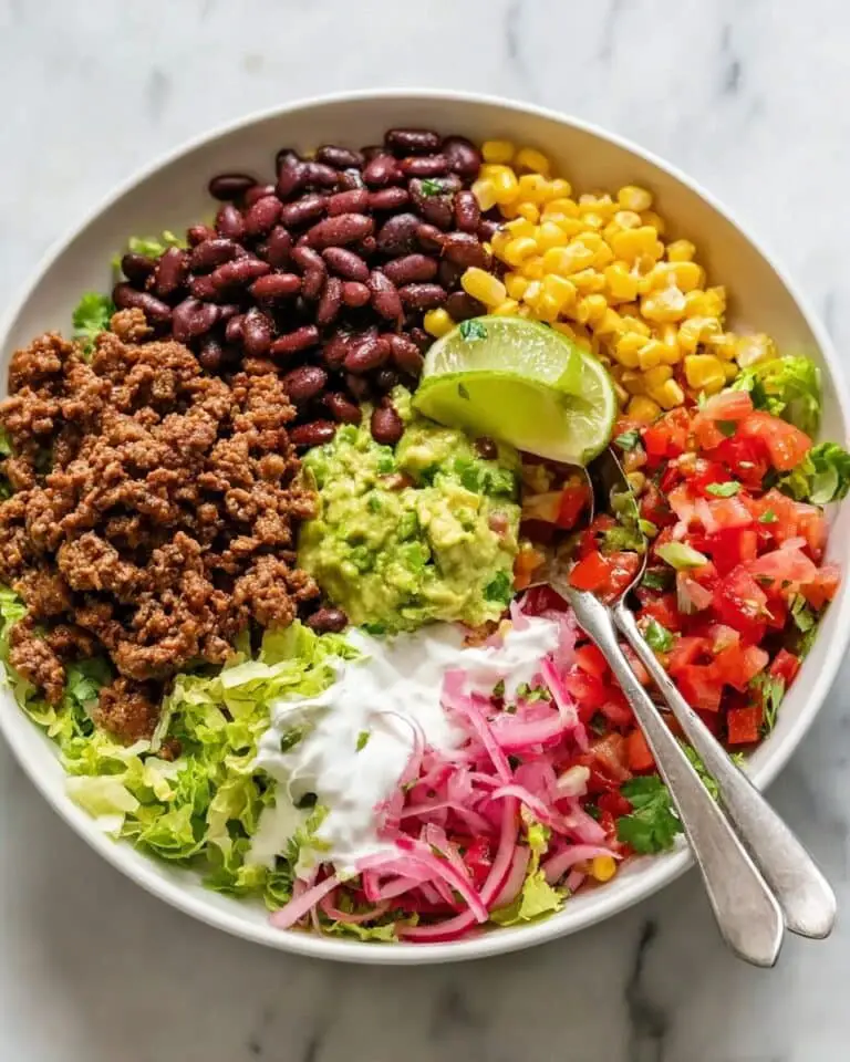 Taco Salad Bowl with Spiced Ground Beef, Corn, Black Beans, and Fresh Toppings Recipe