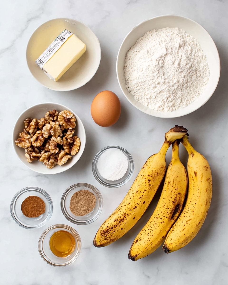 The image shows ingredients neatly arranged on a white marbled surface. There are three ripe bananas with brown spots placed horizontally at the bottom right. Above them, there is a small stick of butter with a wrapper, and next to it is a single brown egg. On the right side, a white bowl is filled with white granulated sugar, and next to it is another white bowl filled with white flour. On the left side, a white bowl contains walnut halves. Four small glass bowls are aligned near the bottom left, holding cinnamon powder, salt, baking soda, and baking powder, with a small drizzle of honey sitting in front of them. The layout is clean and bright, showing all ingredients clearly. photo taken with an iphone --ar 4:5 --v 7