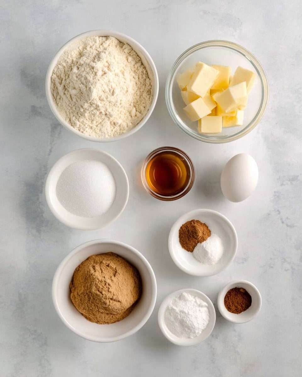The image shows seven white bowls and an egg arranged on a white marbled surface. The top left bowl is filled with a light beige flour with a soft texture. To its right, a clear glass bowl holds yellow cubes of butter. Below the flour, there is a small glass bowl with light brown vanilla liquid. Next to it, a white bowl contains fine white sugar. Below that, a larger white bowl is full of packed light brown sugar. To the right, a white bowl holds several white powders and spices in small rounded piles, including light and dark brown powders. A single white egg sits beside the sugar bowl. photo taken with an iphone --ar 4:5 --v 7