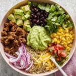 Quinoa Burrito Bowls with Black Beans, Chicken Taco Meat, and Fresh Toppings Recipe
