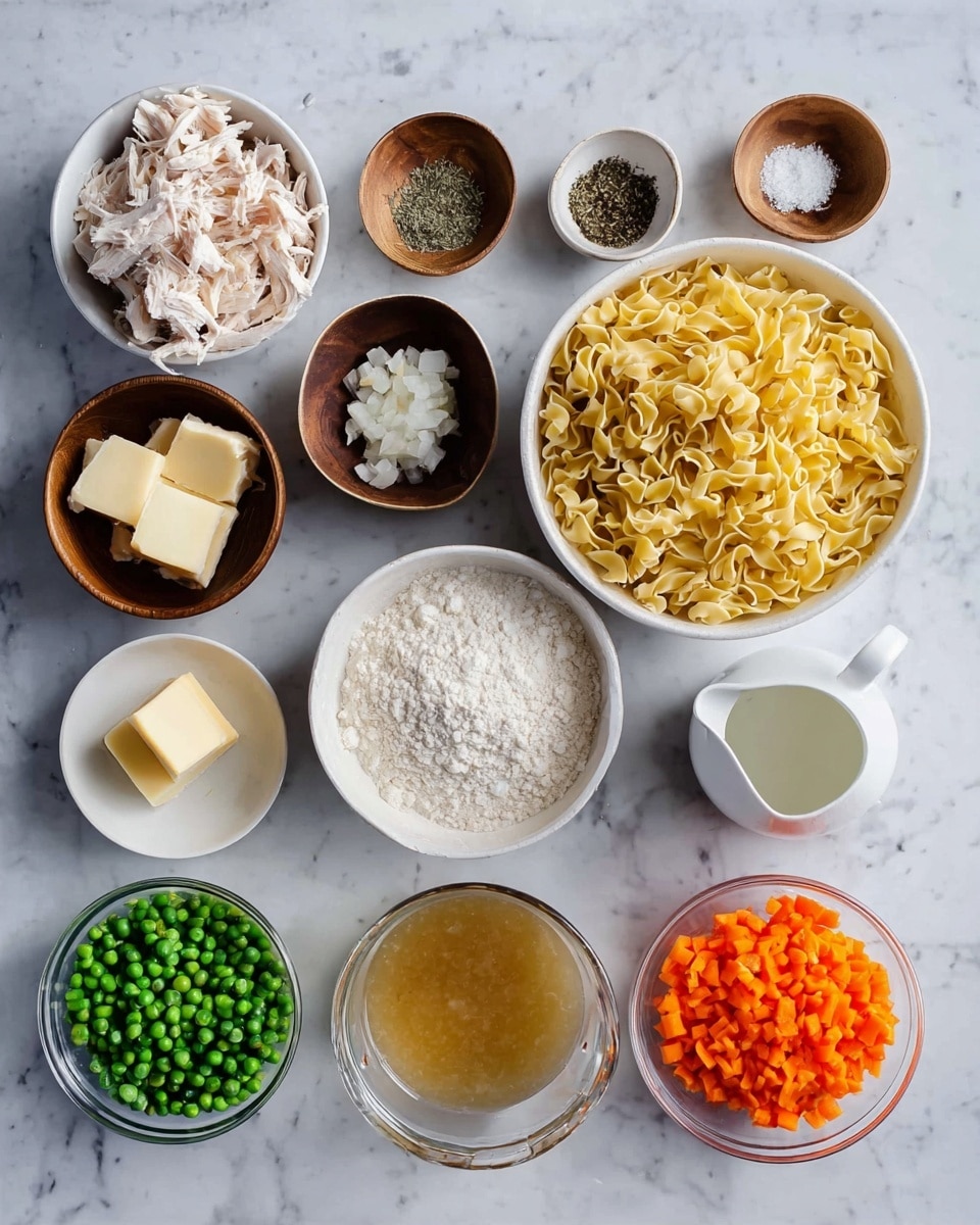 The image shows an overhead view of many ingredients arranged on a white marbled surface. In the top row, from left to right, there is a bowl of light shredded chicken, small wooden bowls with black pepper, dried herbs, and salt, followed by a wooden bowl with minced garlic and another wooden bowl with two squares of butter. In the middle row, there is a large white bowl filled with uncooked yellow egg noodles, a small white round bowl with flour, a small white pitcher with milk, and a measuring cup with golden broth. The bottom row has a small white bowl filled with green peas, a clear glass bowl with chopped white onions, and a clear glass bowl with finely diced orange carrots. All containers hold their contents clearly visible and separated. Photo taken with an iphone --ar 4:5 --v 7