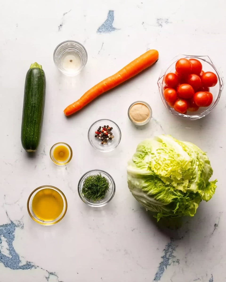The image shows fresh ingredients on a white marbled surface. There is a whole green cucumber and an orange carrot lying next to each other near the top center. A small clear container filled with bright red cherry tomatoes sits on the right side. Below, a large round head of light green lettuce is placed on the surface. Around these main items, there are small glass bowls containing different ingredients: one with yellow olive oil, one with a beige creamy sauce, one with a finely chopped green herb, and one with mixed peppercorns. A small glass holds a light liquid, floating near the top left corner. The overall arrangement is neat and spaced out, with natural bright colors of the fresh produce contrasting with the clean white marbled background photo taken with an iphone --ar 4:5 --v 7