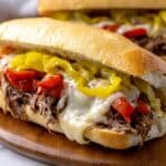 Italian Beef Sandwiches with Melty Cheese, Peppers, and Pepperoncini Recipe