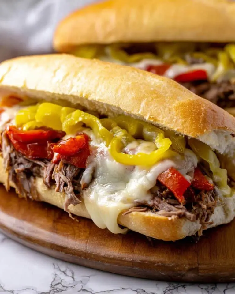 Italian Beef Sandwiches with Melty Cheese, Peppers, and Pepperoncini Recipe
