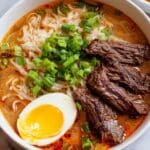 Spicy Korean Ramen with Seared Steak, Soft-Boiled Eggs, and Green Onions Recipe