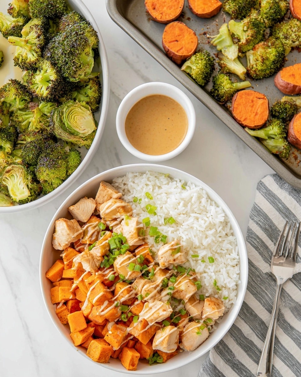 A white bowl filled with three distinct layers: a base layer of plain white rice, a middle layer of small cubes of orange sweet potato, and diced light brown cooked chicken pieces on top of the sweet potato, drizzled with a light brown sauce and small green chopped scallions scattered over. On the left side of the bowl, there are roasted green broccoli florets with some sauce drizzled over as well. Next to the bowl, there is a white small bowl filled with light brown sauce, whole orange sweet potatoes, and a baking tray with roasted broccoli on a white marbled surface. Photo taken with an iphone --ar 4:5 --v 7