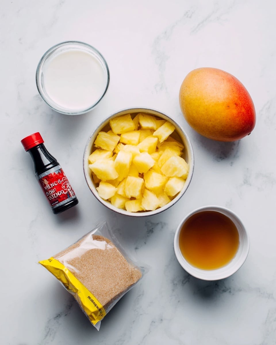 The image shows several ingredients placed on a white marbled surface. In the center is a white bowl filled with diced yellow pineapple pieces. To the top right of the bowl is a whole mango with a smooth orange-yellow skin. To the top left is a small glass container of white coconut milk. Below that is a small bottle of red vanilla extract with a black cap. At the bottom left, there is a yellow bag of light brown sugar with an opened top. Finally, at the bottom right is a small white bowl filled with a thick golden syrup. photo taken with an iphone --ar 4:5 --v 7