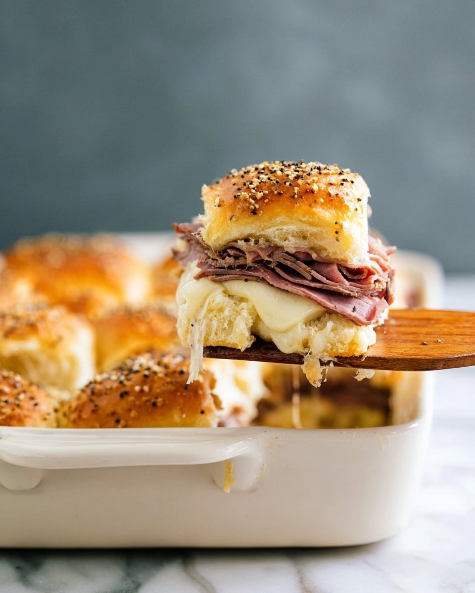 A sandwich shown in close-up has three main layers. The top layer is a golden-brown bun sprinkled with white sesame seeds, soft and slightly toasted. Below the bun is a thick layer of thin, folded slices of pink roast beef with some dark edges. Under the meat, there is melted white cheese flowing slightly over the bottom bun, which is soft and light brown. The sandwich is held together with a pale wooden skewer on a round white plate, placed on a cloth with dark and white parts, all set against a white marbled surface background. photo taken with an iphone --ar 4:5 --v 7