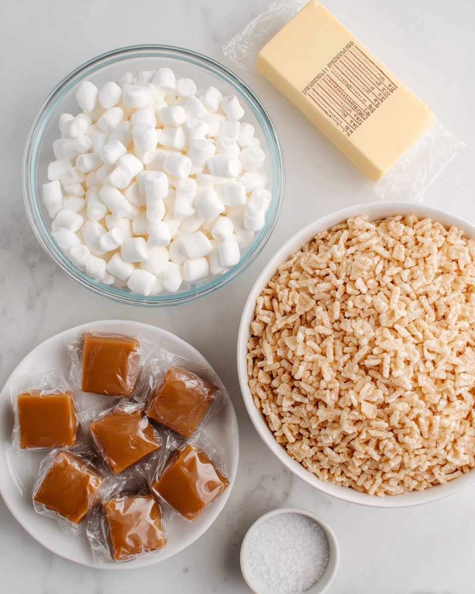 The image shows several ingredients neatly arranged on a white marbled surface. On the left, there is a clear glass bowl filled to the top with small white marshmallows. Below it, a group of individually wrapped caramel candies with a smooth, shiny brown color is spread out. To the right, there is a small clear bowl containing coarse white salt. Further right, a large white bowl is filled with light tan rice crispy cereal, showing its bumpy and puffed texture. In the top right corner, a pale yellow stick of butter wrapped in paper labeled with measurement markings is placed. Photo taken with an iphone --ar 4:5 --v 7