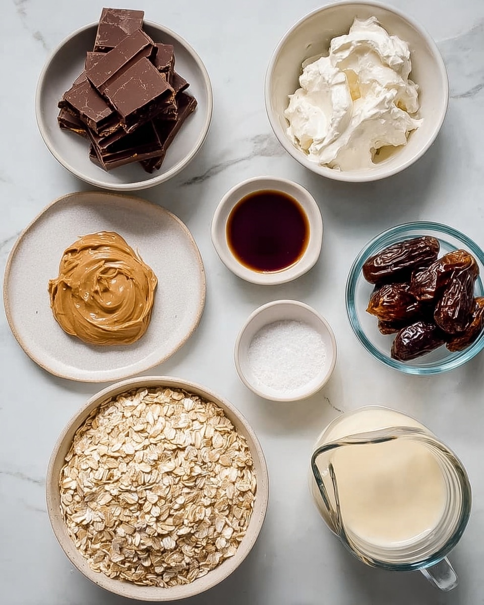 The image shows several small bowls and a glass jug arranged on a white marbled surface. Starting from the top left, there is a white bowl with dark brown square chocolate pieces stacked inside. Below it, another white bowl contains finely shaved chocolate curls. To the right of the shaved chocolate, a white bowl is filled with soft, white cream. Next to the cream bowl is a small white bowl holding dark brown syrup or liquid, and beside that is a small white bowl with white granules, likely salt. Below, a large white bowl is filled with dry, light beige rolled oats. In the lower left corner, there is a white plate with a smooth dollop of tan peanut or nut butter. Next to it, a clear glass jug holds creamy pale liquid, likely milk or cream. Below the jug, a small clear bowl contains dark brown dates. All items are placed neatly with clear separation, and the overall scene is bright and clean. Photo taken with an iphone --ar 4:5 --v 7