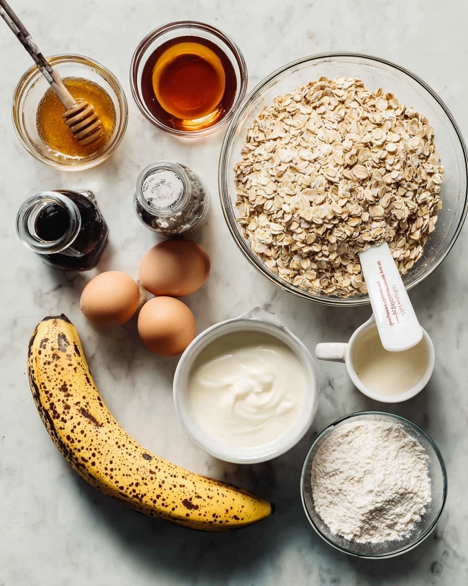 The image shows a collection of baking ingredients placed on a white marbled surface. At the center right is a clear glass bowl filled with light brown rolled oats, with a white measuring cup dipped inside. Below it, also on the right, is a white 1/2 cup measuring cup filled with white creamy yogurt. To the front center lies a ripe, spotted banana with a yellow and brown skin. On the left are three brown eggs aligned in a diagonal row. Above the eggs are three glass containers: a small container with amber honey, a small dark bottle with black vanilla extract, and a clear bottle with dark brown maple syrup. To the far left and front, there is a small white bowl filled with white flour and a spoon inside, and next to it a tiny white bowl of coarse white sea salt. At the top right is an open container with white powder, likely baking powder or soda. The overall setup is tidy and bright. Photo taken with an iphone --ar 4:5 --v 7