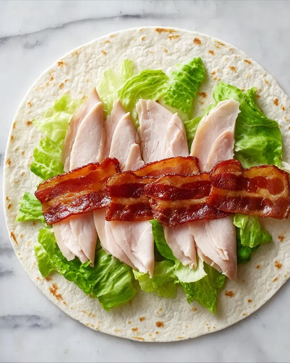 A soft tortilla is laid flat on a white marbled surface with three light pink slices of deli turkey evenly spread across the center. On top of the turkey, there are fresh green lettuce leaves scattered, and over the lettuce, three crispy brown strips of cooked bacon are placed in a neat row across the middle. The textures of the tortilla are smooth, the turkey is thin and slightly shiny, the lettuce is crisp with leafy edges, and the bacon looks crunchy with a shiny glazed look. Photo taken with an iphone --ar 4:5 --v 7