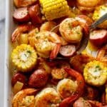 Shrimp Boil Feast with Corn, Sausage, and Fresh Herbs Recipe