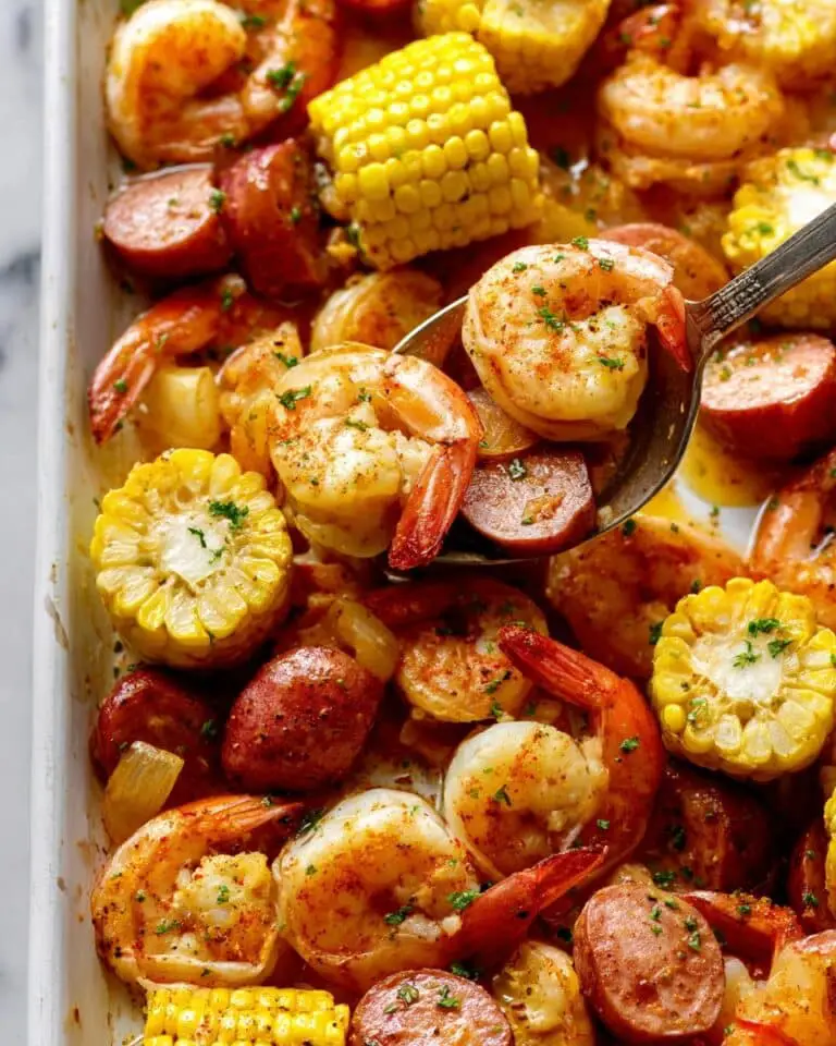 Shrimp Boil Feast with Corn, Sausage, and Fresh Herbs Recipe