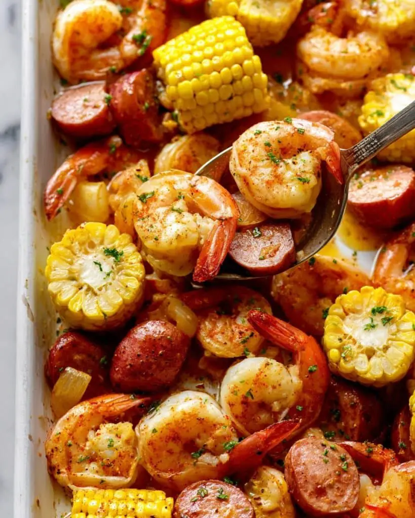 Shrimp Boil Feast with Corn, Sausage, and Fresh Herbs Recipe