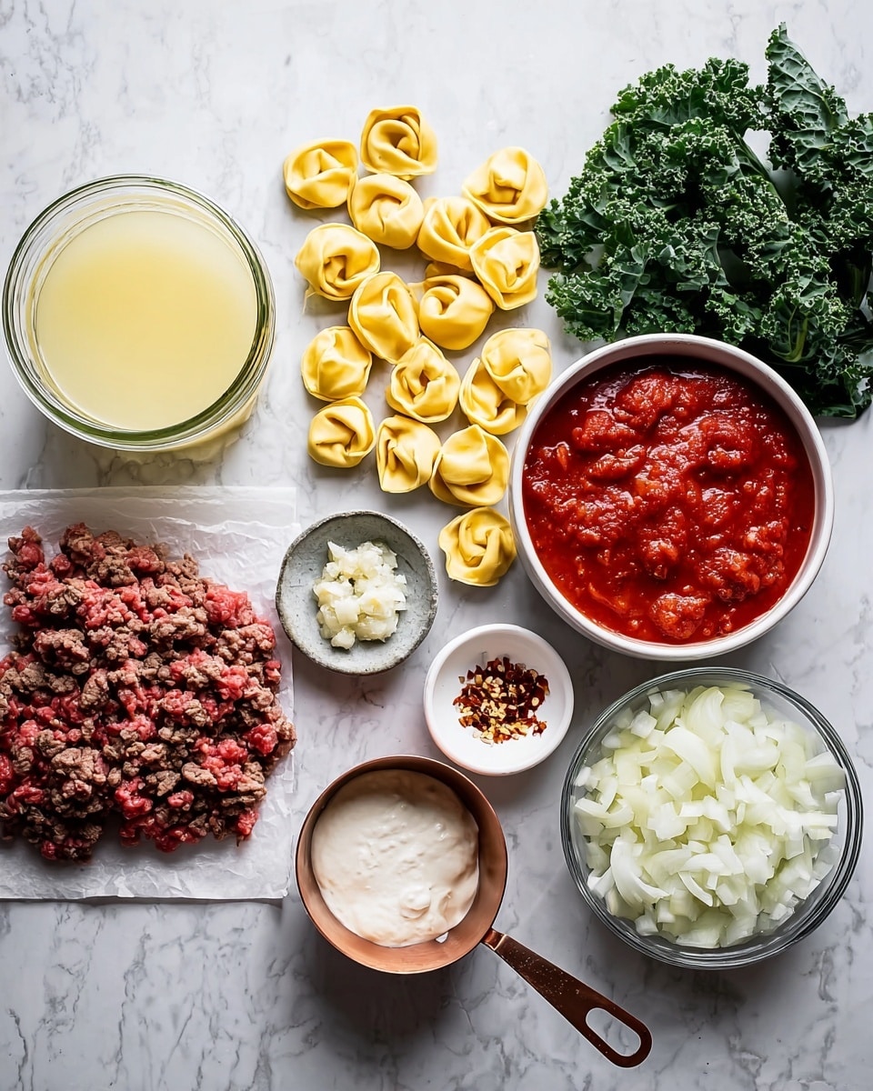 The image shows raw ingredients neatly arranged on a white marbled surface. On the left, a glass jar filled with light yellow broth sits next to a pile of raw ground meat on a white paper. Nearby, a white bowl contains chunky red tomato sauce, and a small gray bowl holds finely chopped white garlic. Scattered across the center are yellow tortellini pasta pieces. Below them, a copper measuring cup is filled with white cream placed next to a small white plate with red pepper flakes. To the right, a transparent glass bowl holds chopped white onions, and a white bowl filled with fresh green kale leaves sits at the far right, creating a vivid contrast. photo taken with an iphone --ar 4:5 --v 7